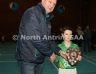 North Antrim Youth Development Officer Declan Heggarty presenting Dunloy team captain Padraig Martin with the North Antrim U10 Division 4 Indoor Hurling League Shield